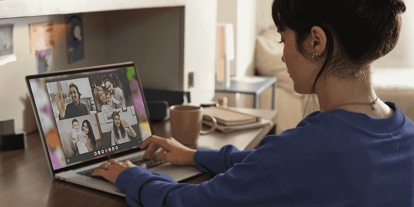 Woman in a videocall in her HP OmniBook laptop