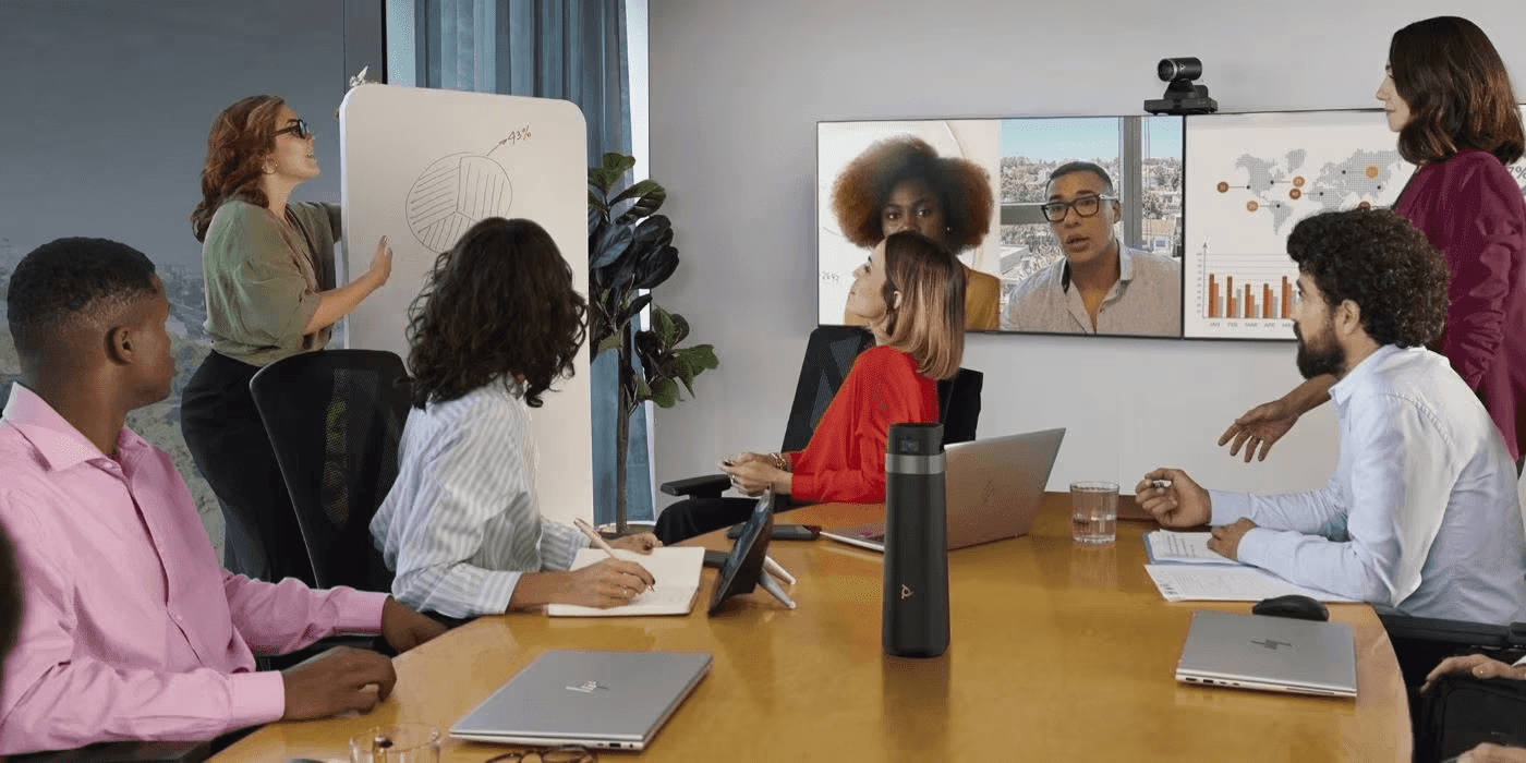 Employees using Zoom in a workspace